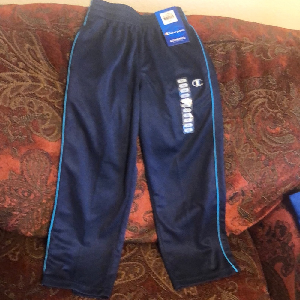 BRAND New kid’s champion sweat pants in navy blue